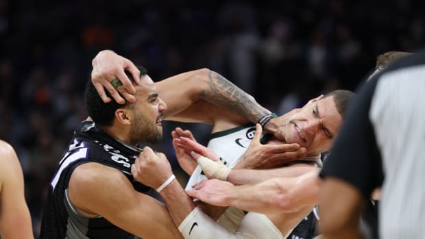 Mar 13, 2023; Sacramento, California, USA; Sacramento Kings center Trey Lyles (41) confronts Milwaukee Bucks center Brook Lopez (11) during the fourth quarter at Golden 1 Center. Mandatory Credit: Kelley L Cox-USA TODAY Sports